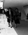20-23-wright3-ws Frank Lloyd Wright with wife Olgivanna walking in the Esplanade leading from E. T. Roux Library to Annie Pfeiffer Chapel c. 1950